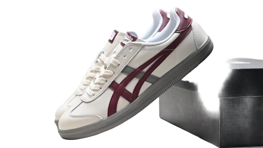 Onitsuka Tiger Tokuten sneakers in white, burgundy, and grey featuring classic design and brand logo on the side.