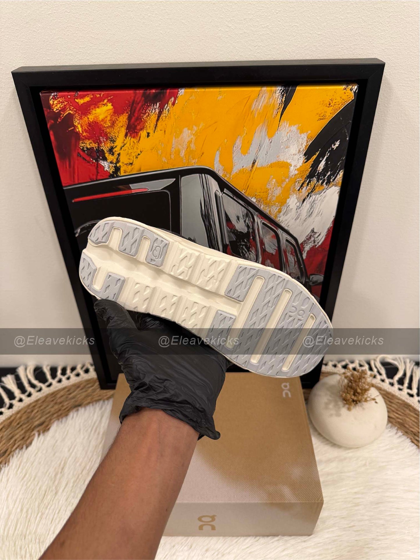 On Cloudtilt sneaker in black and asphalt.