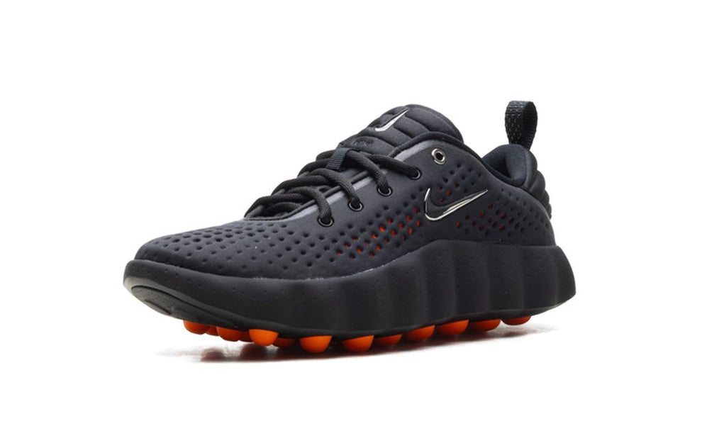Nike Mind 002 "Black Chrome" sneaker in black and chrome finish, featuring sleek design and modern style.