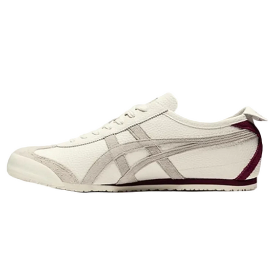 Onitsuka Tiger Mexico 66 sneakers in cream off-white color with white laces and classic design, displayed on a neutral background.