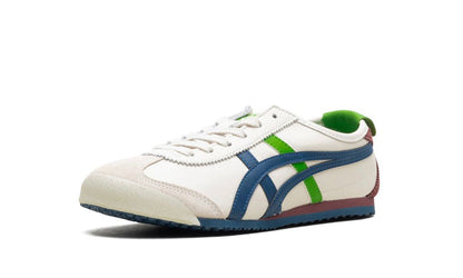 Onitsuka Tiger Mexico 66 sneakers in cream and mako blue with white accents, displayed on a light background.