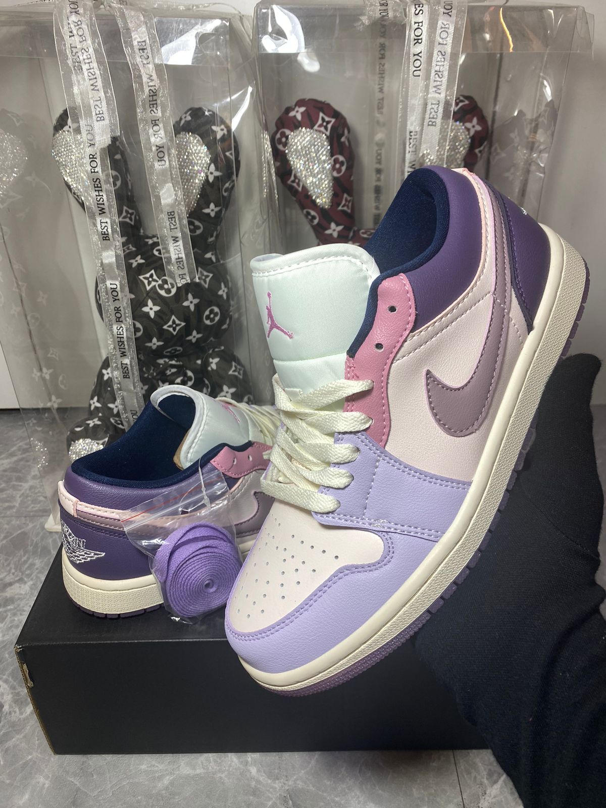 Orixa Kicks Air Jordan 1 Low "Pastel Plum" sneakers in lavender and pink with white accents, displayed on a neutral background.