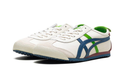 Onitsuka Tiger Mexico 66 sneakers in cream and Mako blue with white accents, displayed on a neutral background.
