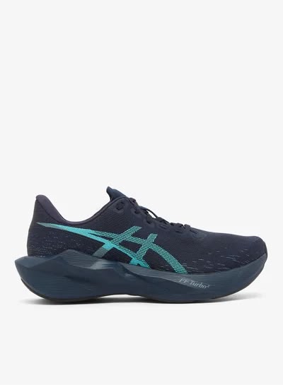 ASICS NOVABLAST 6 running shoes in Midnight and Energy Aqua with breathable mesh upper and cushioned midsole.