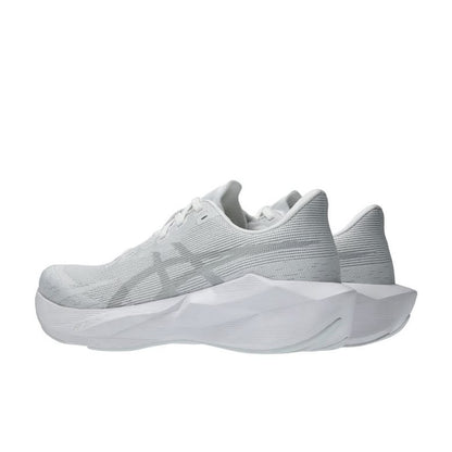 White ASICS NOVABLAST 6 running shoes with breathable mesh upper and cushioned sole, designed for comfort and support.