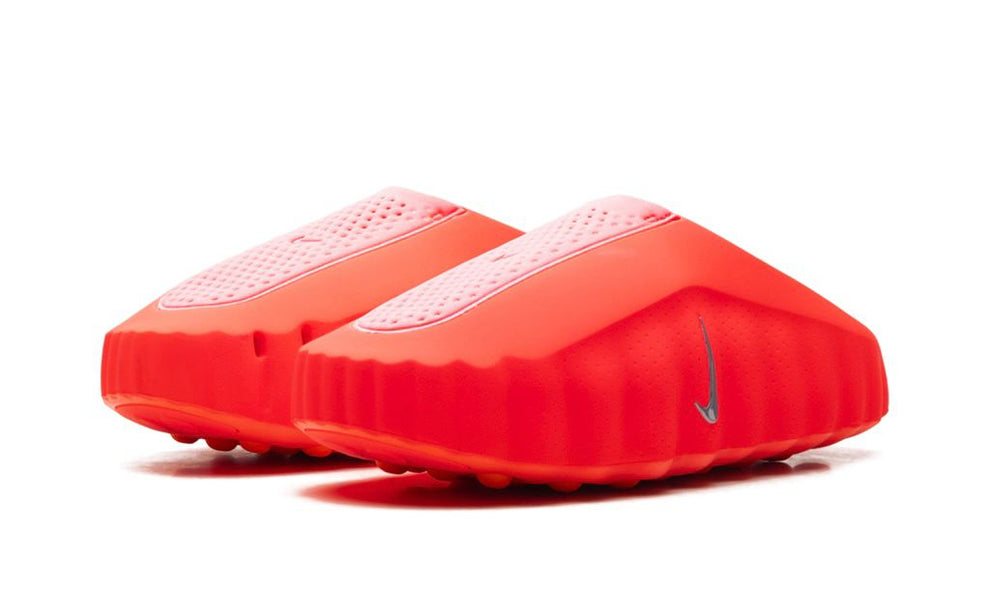 NIKE MIND 001 "Solar Red" sneakers from UAE KICKS showing the vibrant red upper and sleek design.