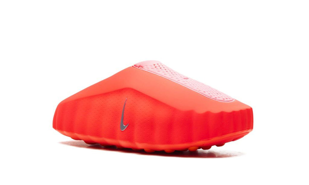 Nike Mind 001 sneakers in Solar Red by UAE Kicks, featuring vibrant red color and sporty design with laces and textured sole.