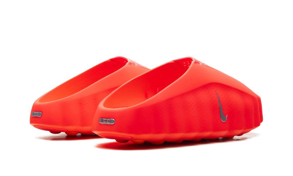 Nike Mind 001 "Solar Red" sneakers in vibrant red with black accents, featuring a sleek athletic design.