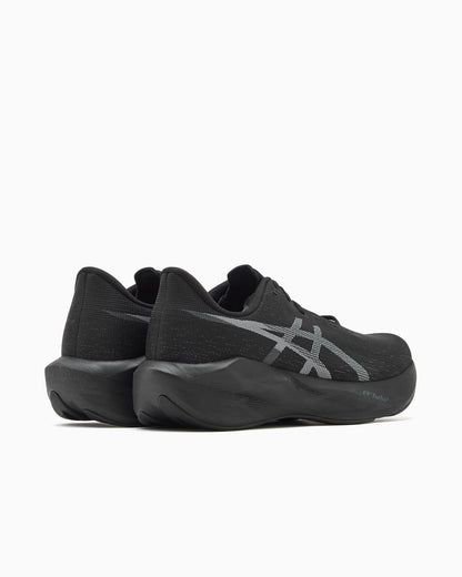 Black ASICS NOVABLAST 6 running shoes with a sleek design, featuring breathable mesh and cushioned midsoles for comfort.