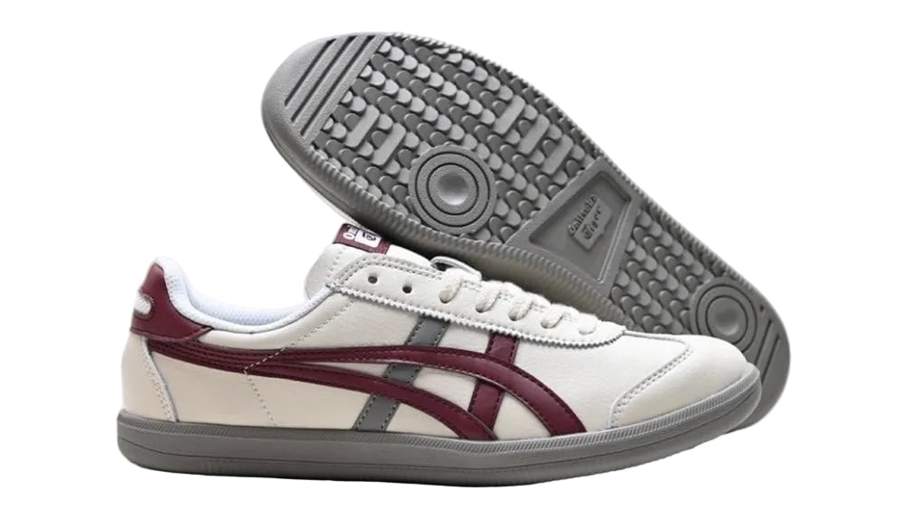 Onitsuka Tiger Tokuten sneakers in white, burgundy, and grey with mesh and leather details, displayed on a plain background.