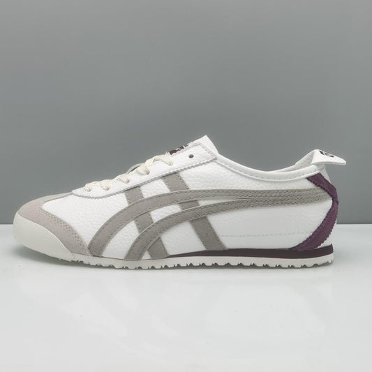 Onitsuka Tiger Mexico 66 sneakers in beige and burgundy with white laces and classic design, displayed on a neutral background.