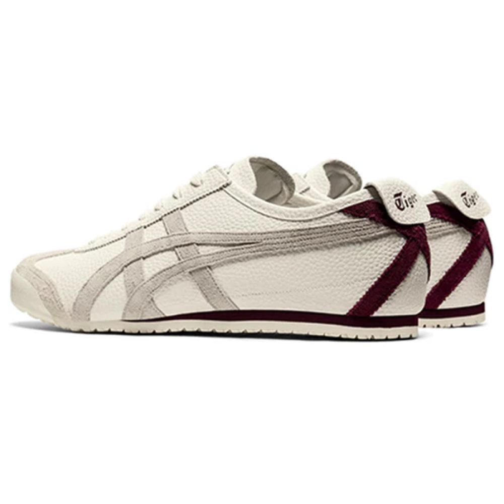 Onitsuka Tiger Mexico 66 sneakers in cream off-white color, featuring classic design and branding, displayed on a neutral background.