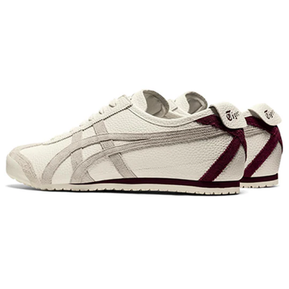 Onitsuka Tiger Mexico 66 sneakers in cream off-white color, featuring classic design and branding, displayed on a neutral background.
