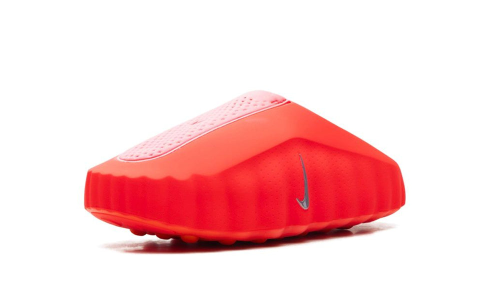 Nike Mind 001 "Solar Red" sneakers in vibrant red with black accents, featuring a sleek design and Nike branding.
