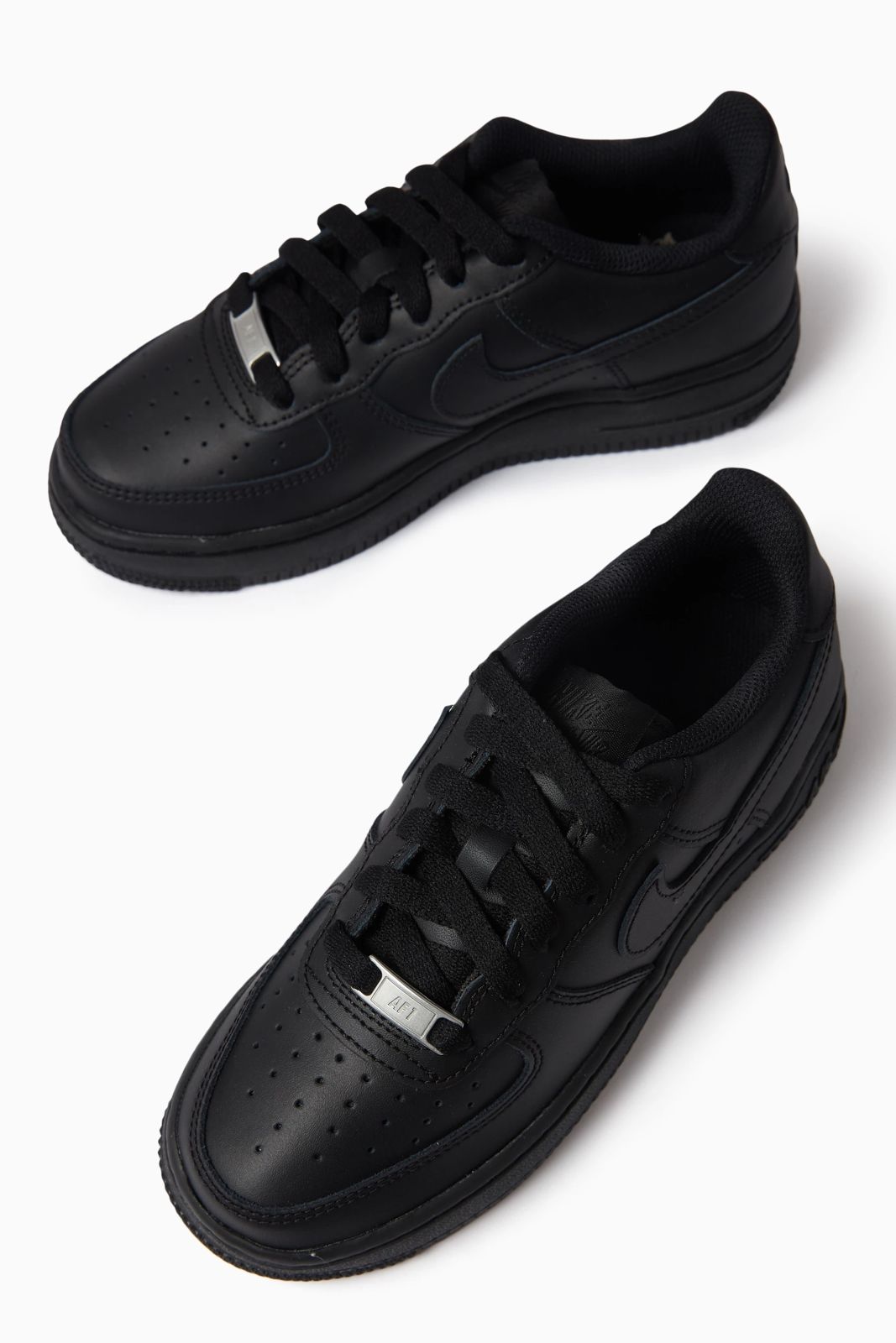 Black Nike Air Force 1 sneakers by Orixa Kicks, showing the classic low-top design with black leather and white sole.