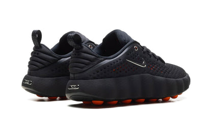 Nike Mind 002 "Black Chrome" sneaker by UAE Kicks featuring sleek black and chrome design, modern athletic shoe style.