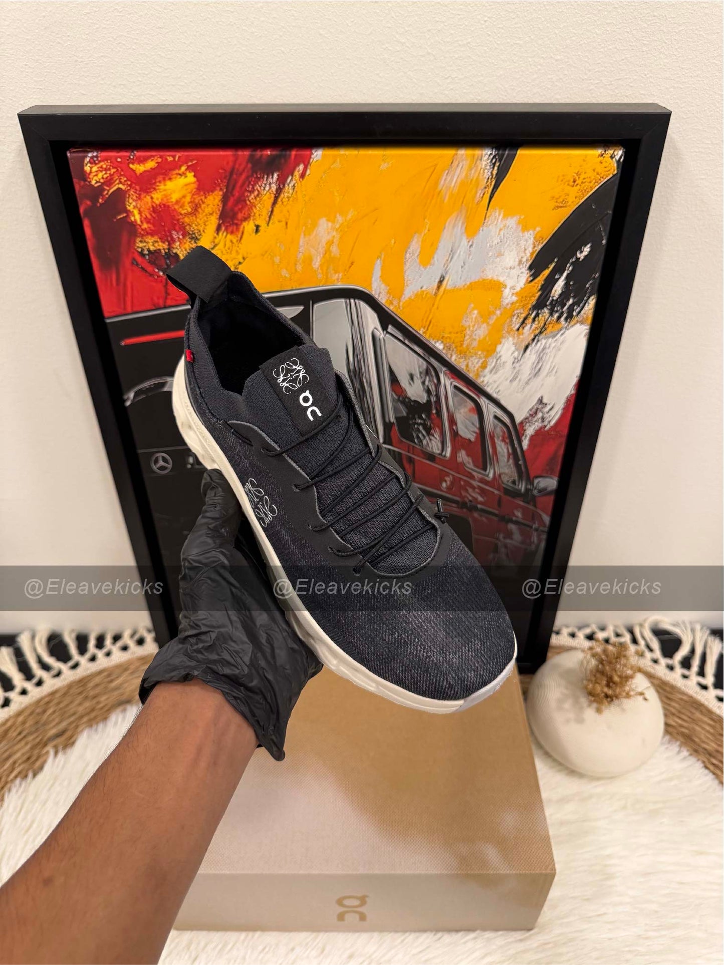 On Cloudtilt sneaker in black and asphalt.